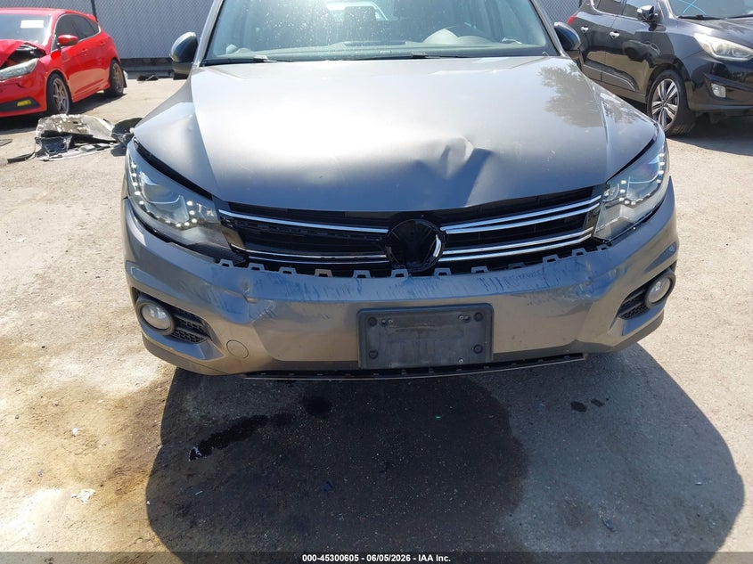 2016 Volkswagen Tiguan VIN WVGAV7AX0GW611711 IAAI salvage auction — FRONT END, Salvage Title, sold $1,700 on 2026-07-13 (photo 6)