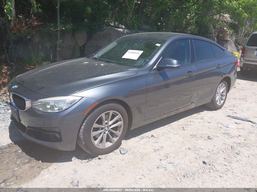 2014 BMW 3er VIN WBA3X5C57ED556896 IAAI salvage auction — REAR END, Wait Title, sold $1,800 on 2026-08-30 (photo 2)