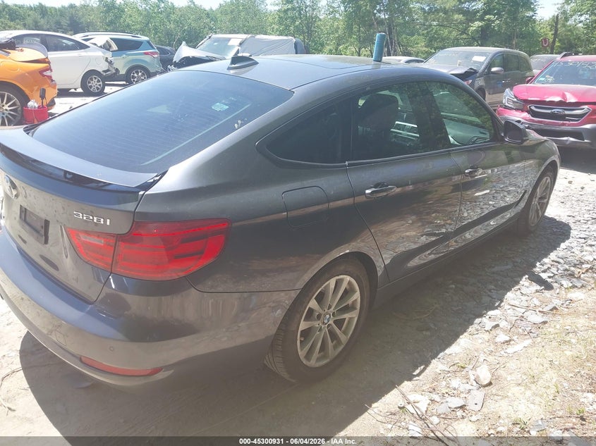 2014 BMW 3er VIN WBA3X5C57ED556896 IAAI salvage auction — REAR END, Wait Title, sold $1,800 on 2026-08-30 (photo 4)