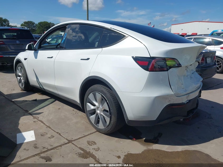 2023 Tesla Model y VIN 7SAYGDEE1PA131363 IAAI salvage auction — REAR END, Salvage Title, sold $10,600 on 2026-07-21 (photo 3)