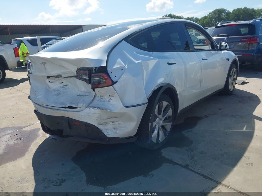 2023 Tesla Model y VIN 7SAYGDEE1PA131363 IAAI salvage auction — REAR END, Salvage Title, sold $10,600 on 2026-07-21 (photo 4)