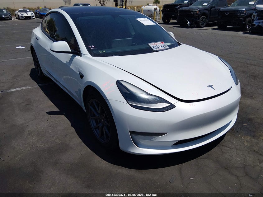 2021 Tesla Model 3 VIN 5YJ3E1EA9MF996718 IAAI salvage auction — RIGHT SIDE, Salvage Title, sold $1,050 on 2026-07-24 (photo 1)