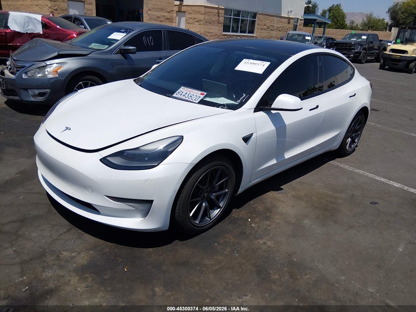 2021 Tesla Model 3 VIN 5YJ3E1EA9MF996718 IAAI salvage auction — RIGHT SIDE, Salvage Title, sold $1,050 on 2026-07-24 (photo 2)