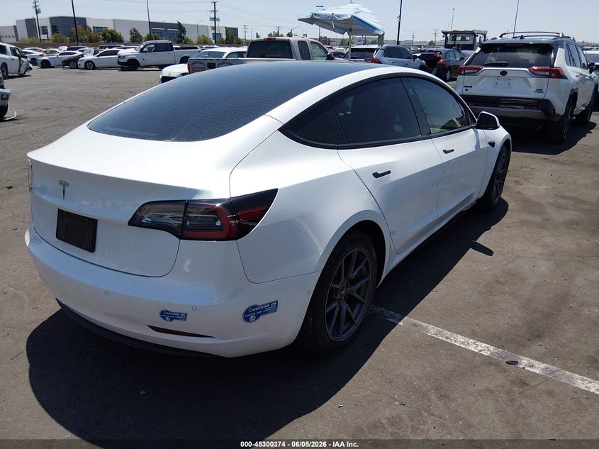 2021 Tesla Model 3 VIN 5YJ3E1EA9MF996718 IAAI salvage auction — RIGHT SIDE, Salvage Title, sold $1,050 on 2026-07-24 (photo 4)