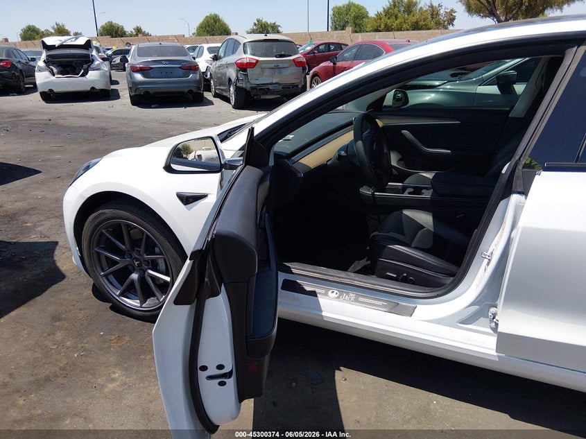2021 Tesla Model 3 VIN 5YJ3E1EA9MF996718 IAAI salvage auction — RIGHT SIDE, Salvage Title, sold $1,050 on 2026-07-24 (photo 5)