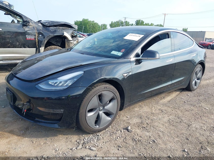 2020 Tesla Model 3 VIN 5YJ3E1EB2LF599777 IAAI salvage auction — REAR END, Salvage Title, sold $3,750 on 2026-07-30 (photo 2)