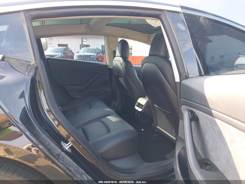 2020 Tesla Model 3 VIN 5YJ3E1EB2LF599777 IAAI salvage auction — REAR END, Salvage Title, sold $3,750 on 2026-07-30 (photo 8)