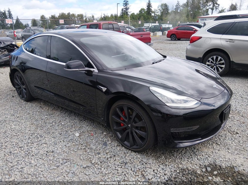 2020 Tesla Model 3 VIN 5YJ3E1EC2LF741943 IAAI salvage auction — REAR END, Salvage Title, sold $7,700 on 2026-07-12 (photo 1)