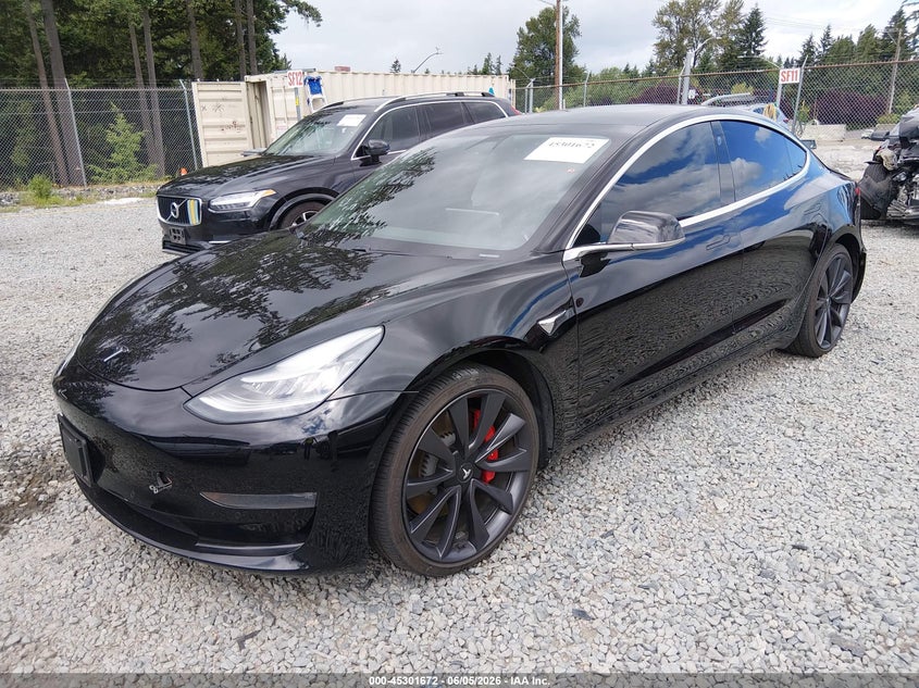 2020 Tesla Model 3 VIN 5YJ3E1EC2LF741943 IAAI salvage auction — REAR END, Salvage Title, sold $7,700 on 2026-07-12 (photo 2)