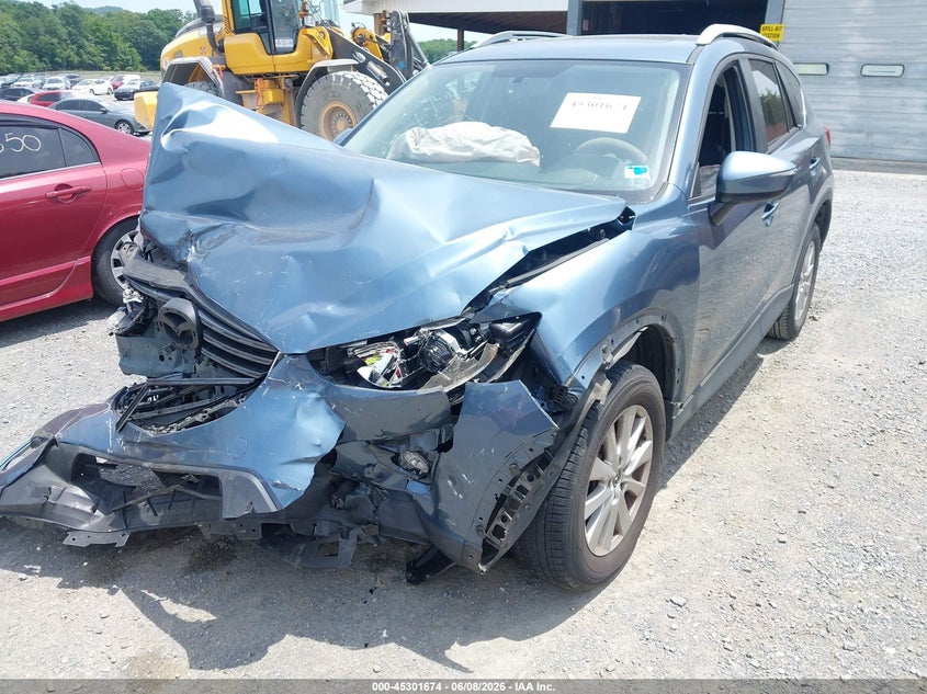 2016 Mazda Cx-5 VIN JM3KE2CYXG0746769 IAAI salvage auction — FRONT END, Salvage Title, sold $1,400 on 2026-07-14 (photo 6)