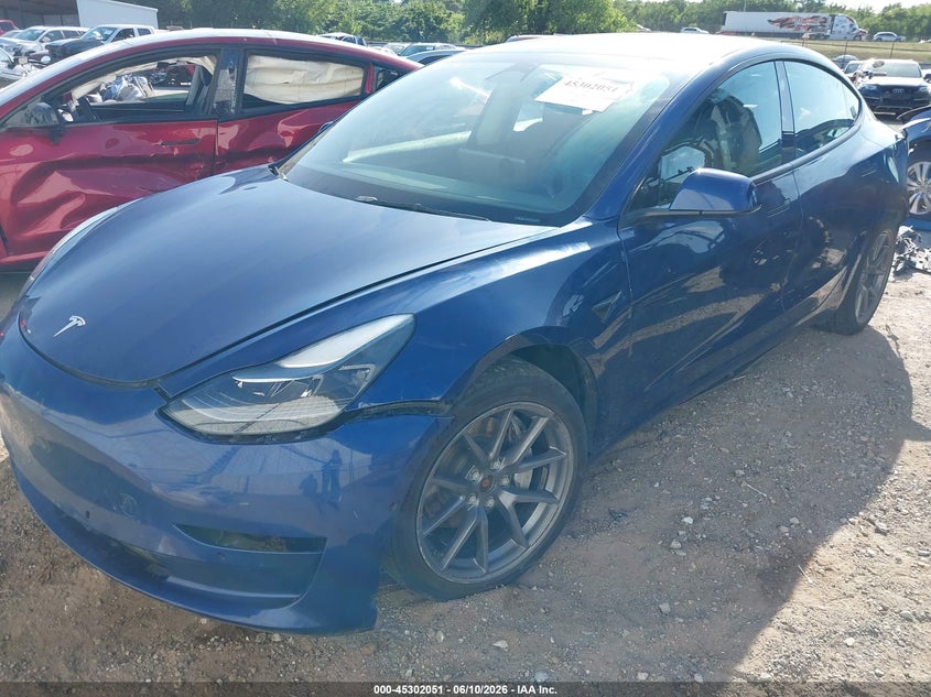 2022 Tesla Model 3 VIN 5YJ3E1EB3NF290435 IAAI salvage auction — FRONT & REAR, Clear (Oklahoma), sold $5,300 on 2026-08-01 (photo 2)