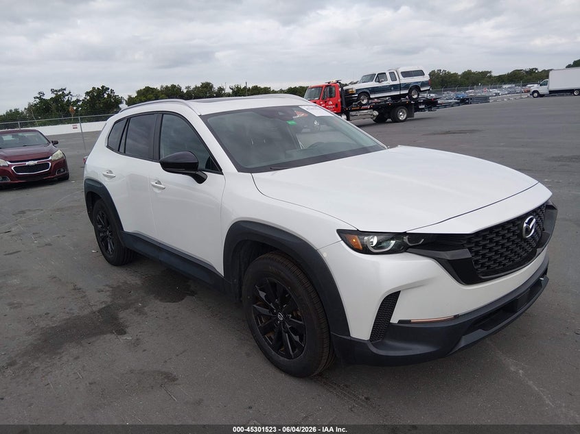 2023 Mazda Cx-50 VIN 7MMVABCM6PN109587 IAAI salvage auction — SIDE, Salvage Title, sold $8,400 on 2026-07-10 (photo 1)