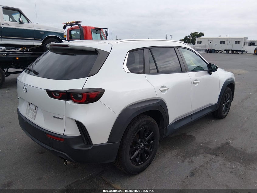 2023 Mazda Cx-50 VIN 7MMVABCM6PN109587 IAAI salvage auction — SIDE, Salvage Title, sold $8,400 on 2026-07-10 (photo 4)