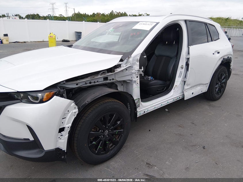 2023 Mazda Cx-50 VIN 7MMVABCM6PN109587 IAAI salvage auction — SIDE, Salvage Title, sold $8,400 on 2026-07-10 (photo 6)