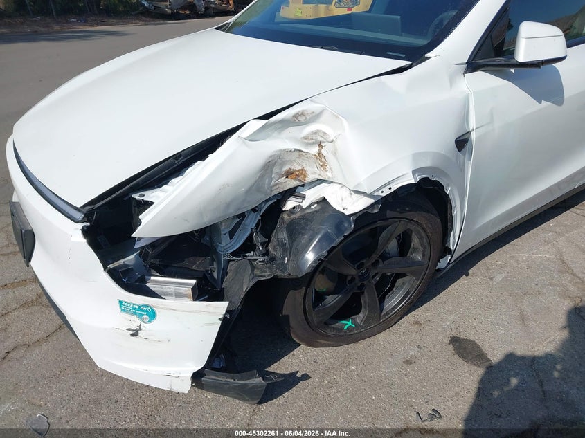 2026 Tesla Model y VIN 7SAYGDED3TF408356 IAAI salvage auction — LEFT FRONT, Salvage (California), sold $22,050 on 2026-07-27 (photo 6)