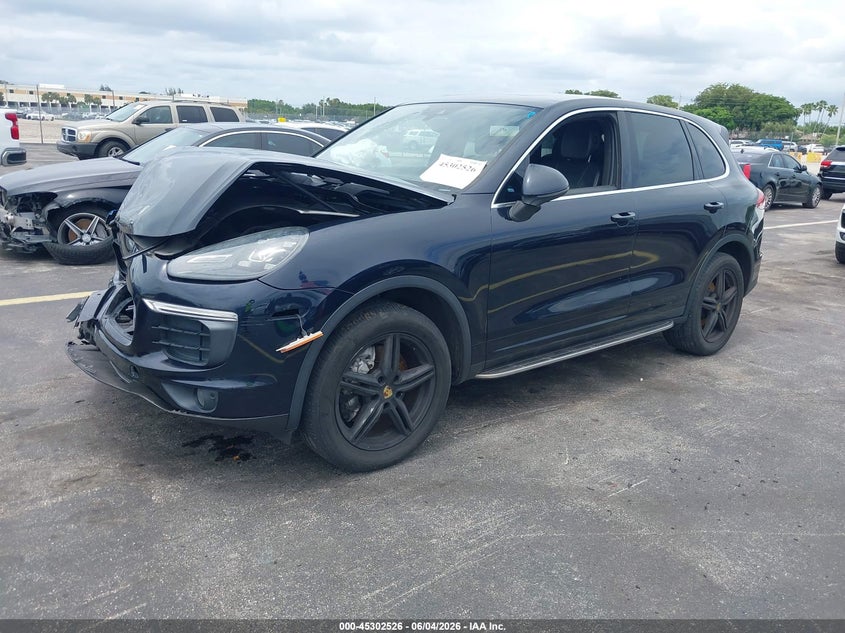 2016 Porsche Cayenne VIN WP1AA2A20GLA09771 IAAI salvage auction — FRONT END, Rebuildable (Florida), sold $675 on 2026-07-30 (photo 2)