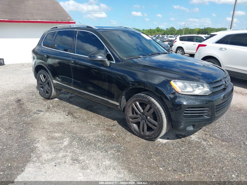 2014 Volkswagen Touareg VIN WVGEF9BP0ED008548 IAAI salvage auction — LEFT FRONT, Clear (Florida), sold $750 on 2026-07-14 (photo 1)