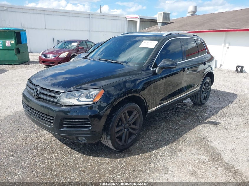 2014 Volkswagen Touareg VIN WVGEF9BP0ED008548 IAAI salvage auction — LEFT FRONT, Clear (Florida), sold $750 on 2026-07-14 (photo 2)