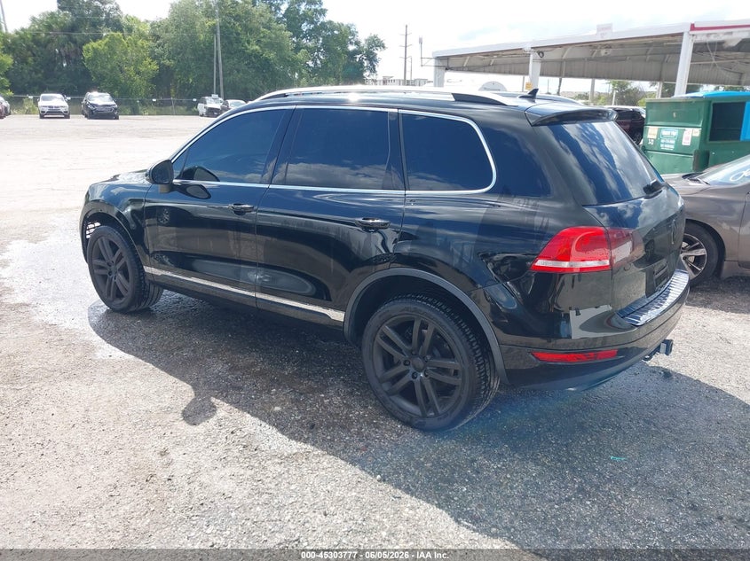 2014 Volkswagen Touareg VIN WVGEF9BP0ED008548 IAAI salvage auction — LEFT FRONT, Clear (Florida), sold $750 on 2026-07-14 (photo 3)