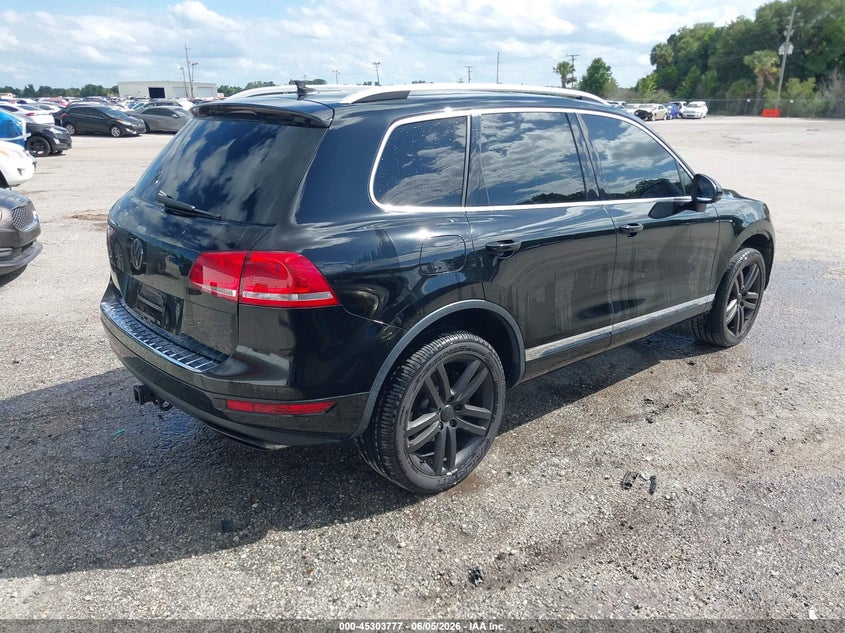 2014 Volkswagen Touareg VIN WVGEF9BP0ED008548 IAAI salvage auction — LEFT FRONT, Clear (Florida), sold $750 on 2026-07-14 (photo 4)