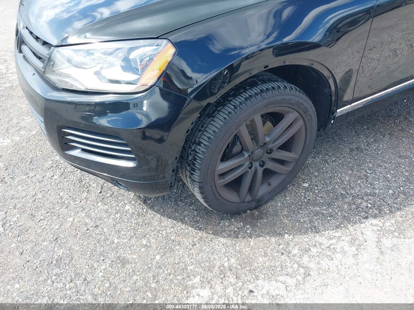 2014 Volkswagen Touareg VIN WVGEF9BP0ED008548 IAAI salvage auction — LEFT FRONT, Clear (Florida), sold $750 on 2026-07-14 (photo 6)