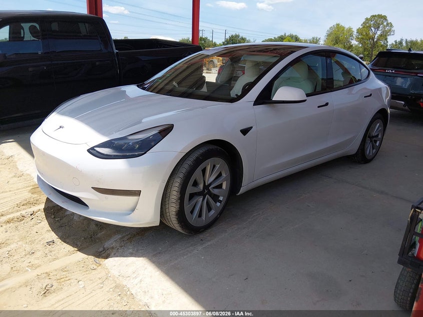 2021 Tesla Model 3 VIN 5YJ3E1EA8MF987704 IAAI salvage auction — RIGHT SIDE, Salvage Title, sold $4,900 on 2026-07-16 (photo 2)