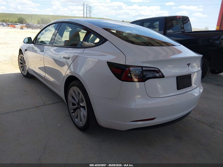 2021 Tesla Model 3 VIN 5YJ3E1EA8MF987704 IAAI salvage auction — RIGHT SIDE, Salvage Title, sold $4,900 on 2026-07-16 (photo 3)