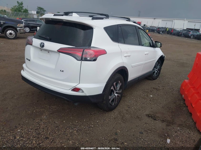 2017 Toyota Rav 4 VIN JTMZFREV1HJ121169 IAAI salvage auction — ROLLOVER, Salvage Title, sold $3,825 on 2026-07-15 (photo 4)