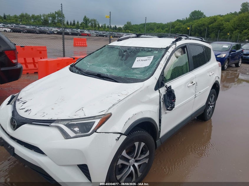 2017 Toyota Rav 4 VIN JTMZFREV1HJ121169 IAAI salvage auction — ROLLOVER, Salvage Title, sold $3,825 on 2026-07-15 (photo 6)