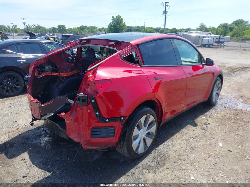 2023 Tesla Model y VIN 7SAYGDEE7PF667849 IAAI salvage auction — REAR END, Salvage (Virginia), sold $11,450 on 2026-07-24 (photo 4)