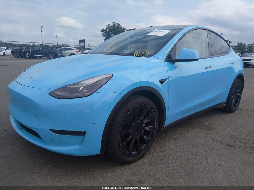 2023 Tesla Model y VIN 7SAYGAEE9PF645026 IAAI salvage auction — RIGHT FRONT, Salvage (New Jersey), sold $15,600 on 2026-07-30 (photo 2)