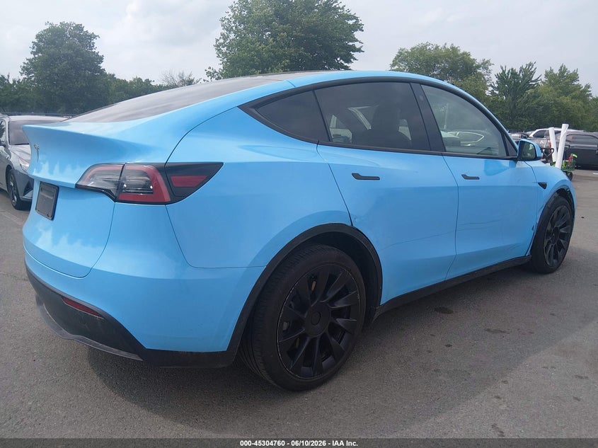2023 Tesla Model y VIN 7SAYGAEE9PF645026 IAAI salvage auction — RIGHT FRONT, Salvage (New Jersey), sold $15,600 on 2026-07-30 (photo 4)
