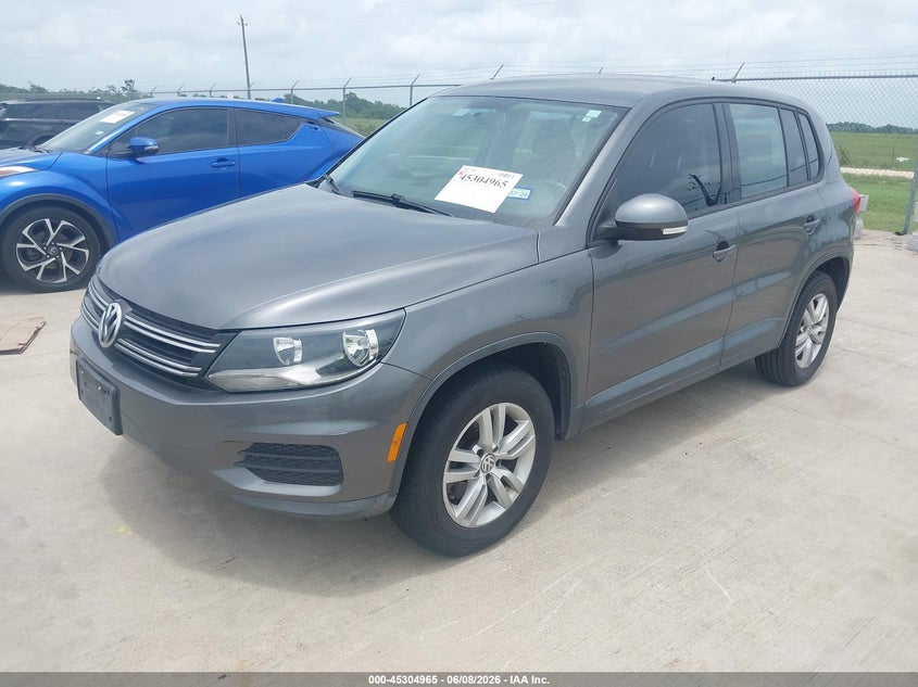 2014 Volkswagen Tiguan VIN WVGAV3AX2EW619444 IAAI salvage auction — HAIL, Salvage Title, sold $825 on 2026-07-10 (photo 2)