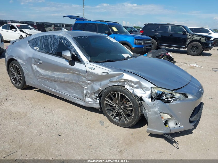 2015 Scion Fr-s VIN JF1ZNAA13F9702457 IAAI salvage auction — SIDE, Salvage Title, sold $2,000 on 2026-08-21 (photo 1)