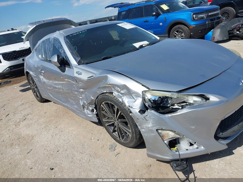 2015 Scion Fr-s VIN JF1ZNAA13F9702457 IAAI salvage auction — SIDE, Salvage Title, sold $2,000 on 2026-08-21 (photo 6)