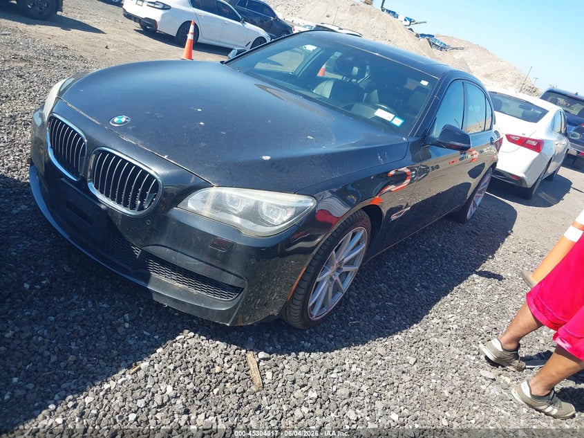 2014 BMW 7er VIN WBAYF8C53ED653765 IAAI salvage auction — NORMAL WEAR, Clear (New York), sold $975 on 2026-07-07 (photo 2)