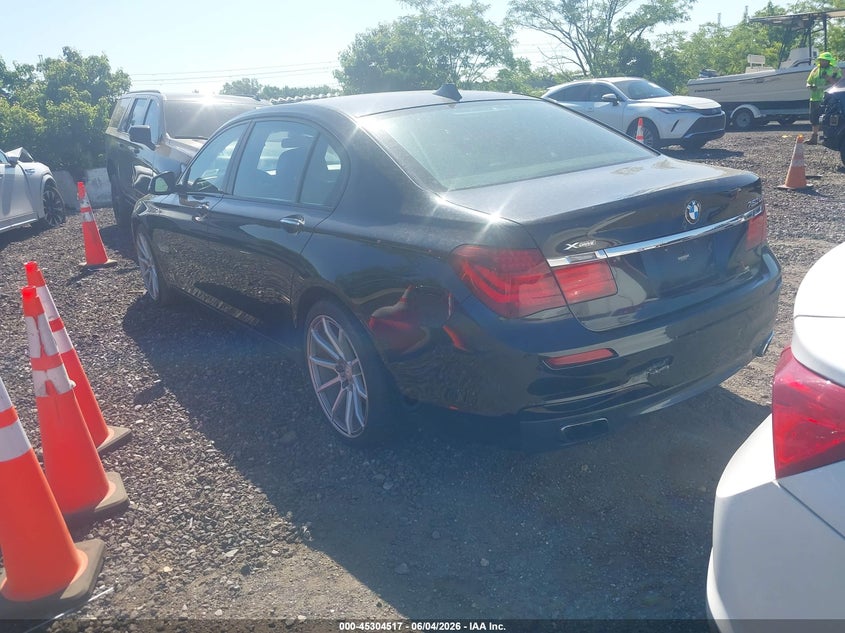 2014 BMW 7er VIN WBAYF8C53ED653765 IAAI salvage auction — NORMAL WEAR, Clear (New York), sold $975 on 2026-07-07 (photo 3)