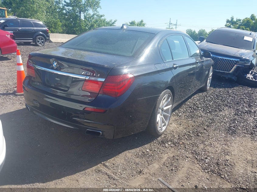 2014 BMW 7er VIN WBAYF8C53ED653765 IAAI salvage auction — NORMAL WEAR, Clear (New York), sold $975 on 2026-07-07 (photo 4)