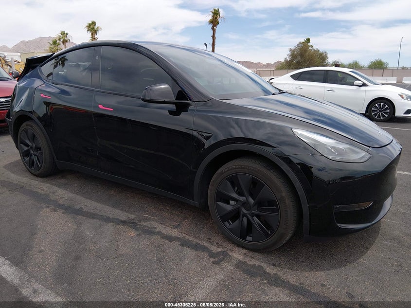 2025 Tesla Model y VIN 7SAYGDED9SF313878 IAAI salvage auction — REAR END, Salvage (Nevada), sold $10,900 on 2026-07-30 (photo 1)