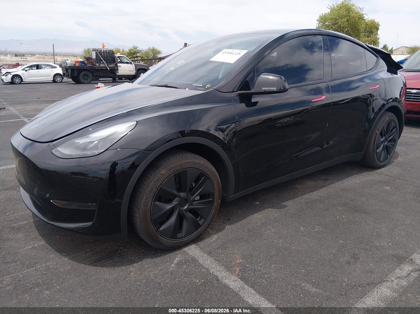 2025 Tesla Model y VIN 7SAYGDED9SF313878 IAAI salvage auction — REAR END, Salvage (Nevada), sold $10,900 on 2026-07-30 (photo 2)