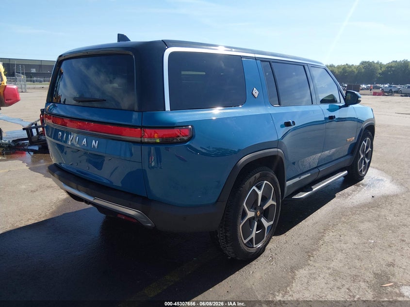 2023 Rivian R1s VIN 7PDSGABA3PN014299 IAAI salvage auction — HAIL, Salvage Title, sold $30,750 on 2026-07-07 (photo 4)