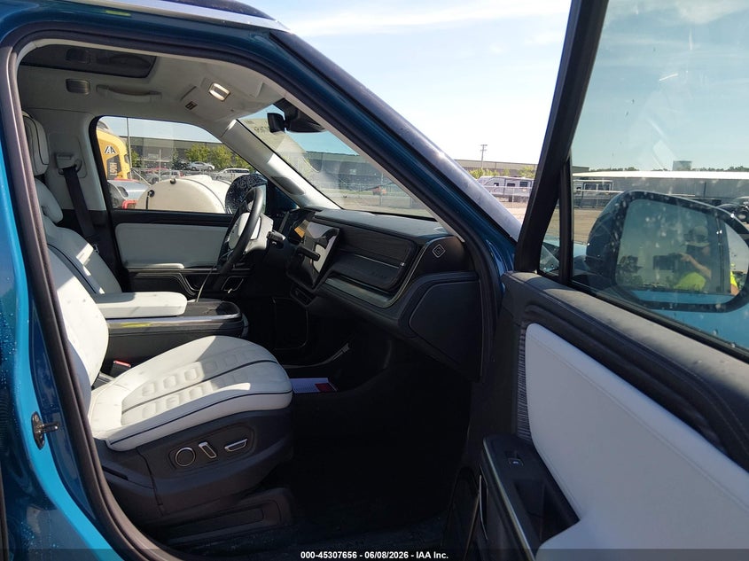 2023 Rivian R1s VIN 7PDSGABA3PN014299 IAAI salvage auction — HAIL, Salvage Title, sold $30,750 on 2026-07-07 (photo 5)