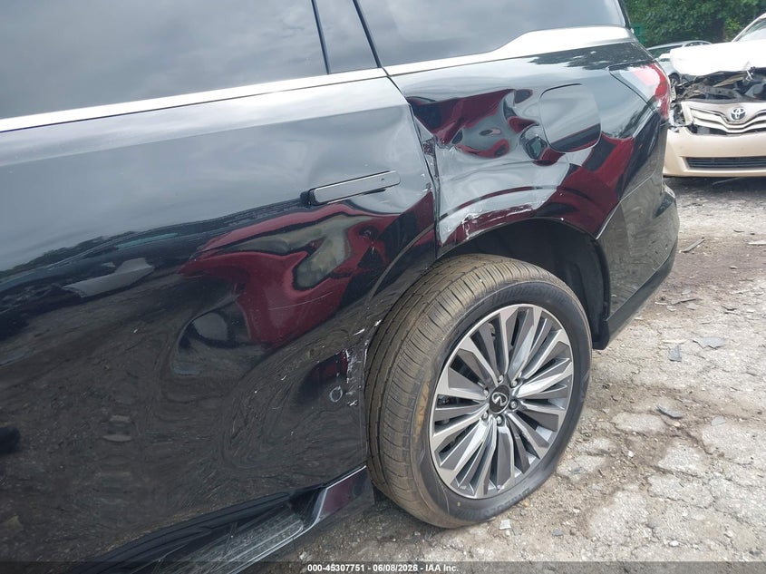 2025 Infiniti Qx80 VIN JN8AZ3DB5S9402574 IAAI salvage auction — SIDE, Wait Title, sold $33,250 on 2026-09-27 (photo 6)