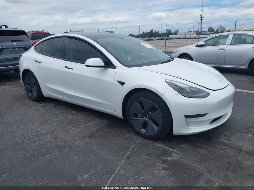 2023 Tesla Model 3 VIN 5YJ3E1EA8PF474229 IAAI salvage auction — WATER/FLOOD, Salvage Title, sold $7,500 on 2026-07-09 (photo 1)