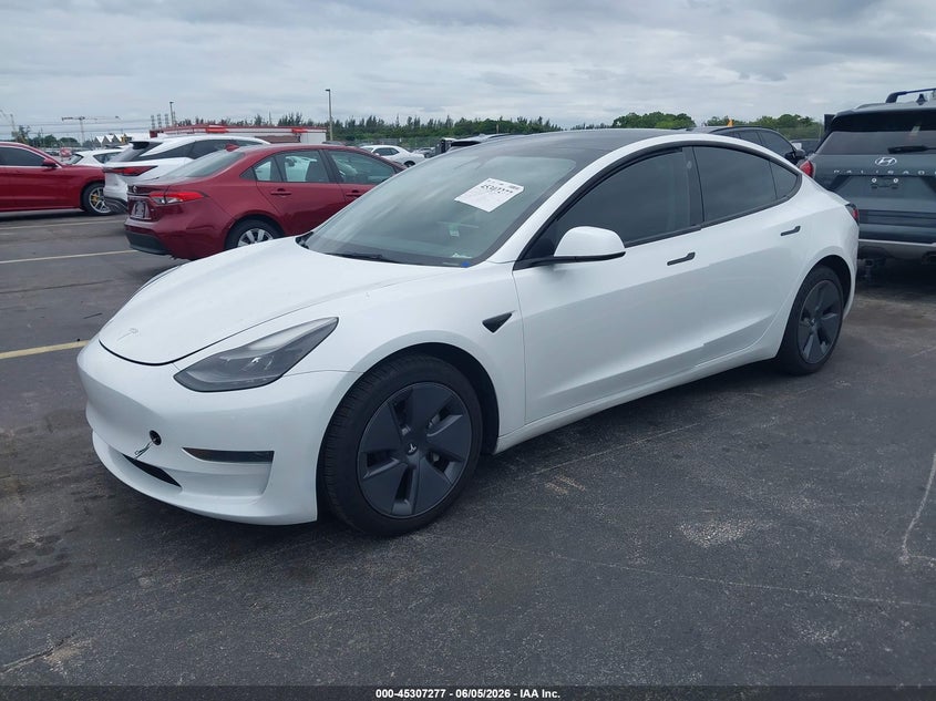 2023 Tesla Model 3 VIN 5YJ3E1EA8PF474229 IAAI salvage auction — WATER/FLOOD, Salvage Title, sold $7,500 on 2026-07-09 (photo 2)
