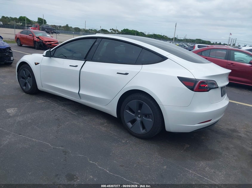 2023 Tesla Model 3 VIN 5YJ3E1EA8PF474229 IAAI salvage auction — WATER/FLOOD, Salvage Title, sold $7,500 on 2026-07-09 (photo 3)