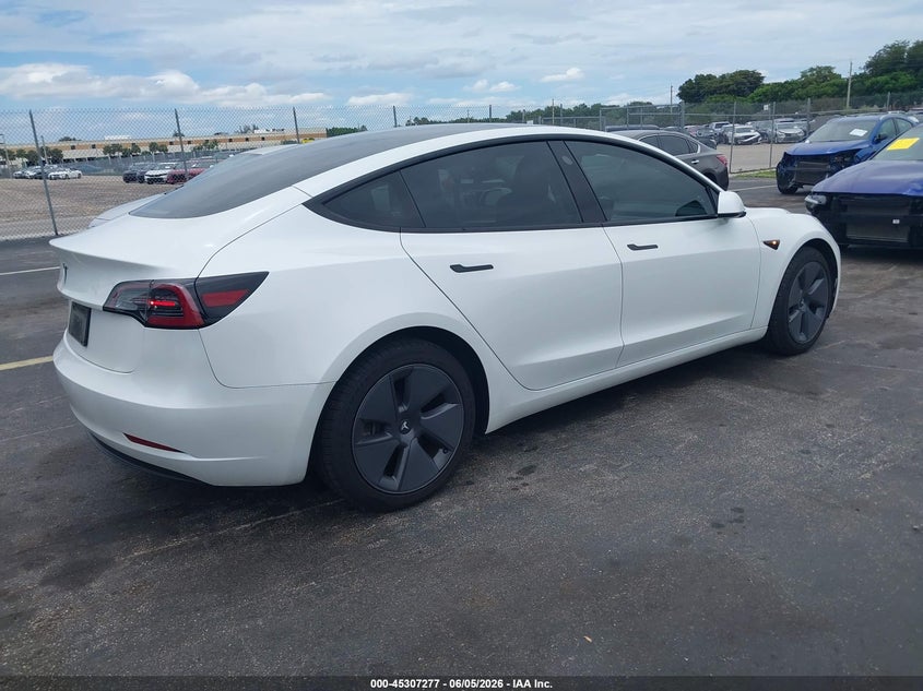 2023 Tesla Model 3 VIN 5YJ3E1EA8PF474229 IAAI salvage auction — WATER/FLOOD, Salvage Title, sold $7,500 on 2026-07-09 (photo 4)