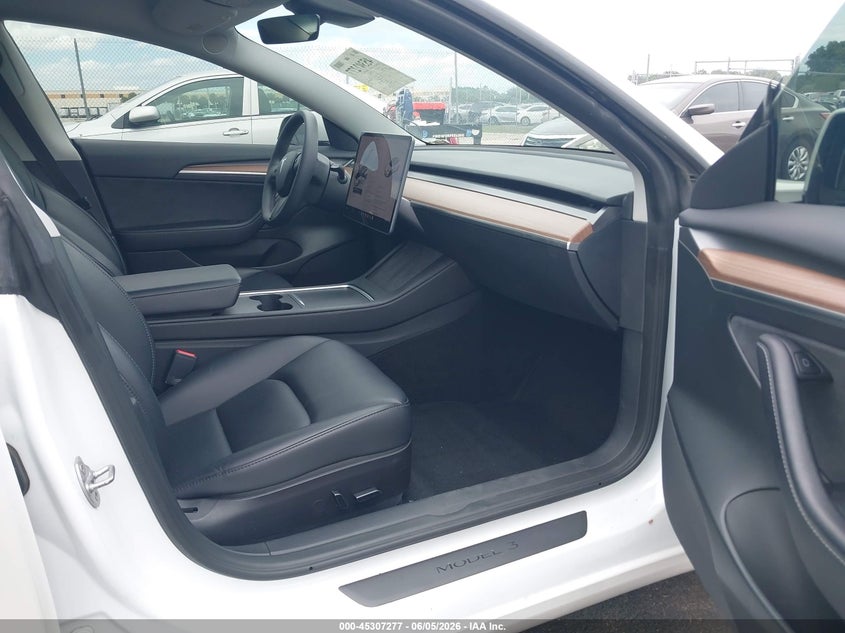 2023 Tesla Model 3 VIN 5YJ3E1EA8PF474229 IAAI salvage auction — WATER/FLOOD, Salvage Title, sold $7,500 on 2026-07-09 (photo 5)