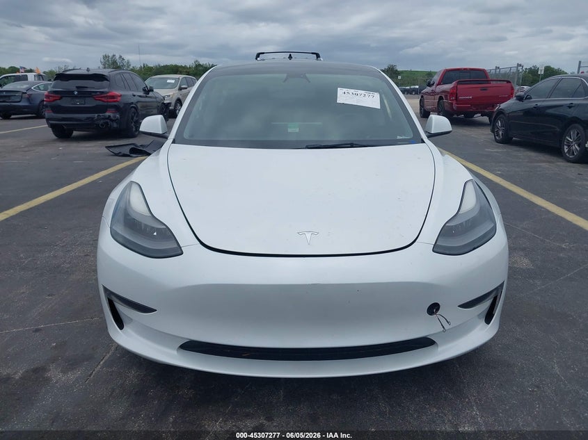2023 Tesla Model 3 VIN 5YJ3E1EA8PF474229 IAAI salvage auction — WATER/FLOOD, Salvage Title, sold $7,500 on 2026-07-09 (photo 6)