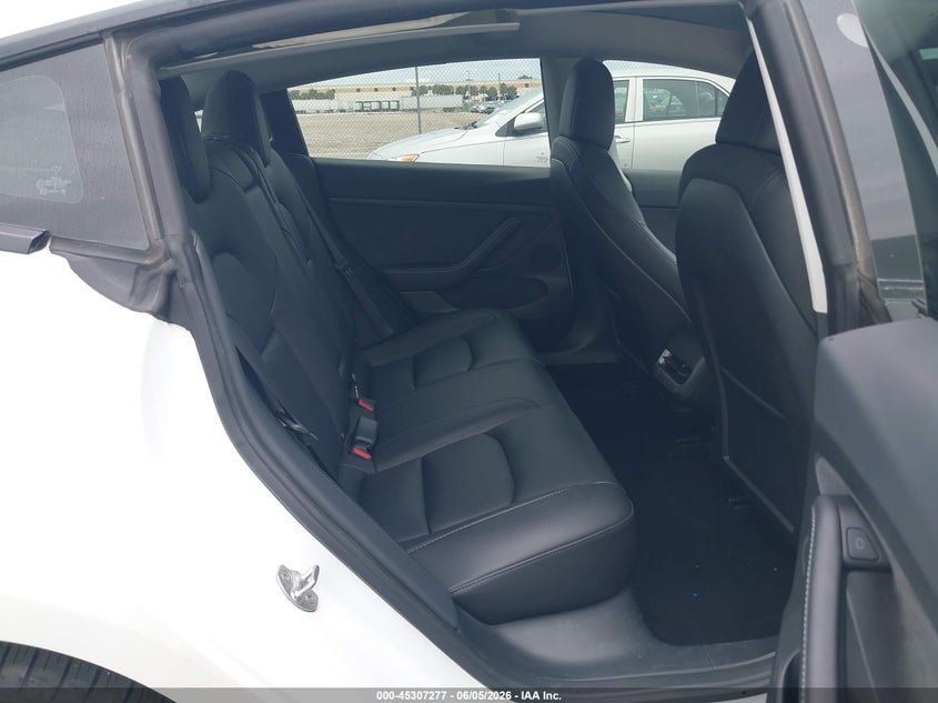 2023 Tesla Model 3 VIN 5YJ3E1EA8PF474229 IAAI salvage auction — WATER/FLOOD, Salvage Title, sold $7,500 on 2026-07-09 (photo 8)